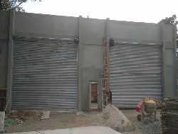 Fabricante porta automática de enrolar em aço preço Imagem
